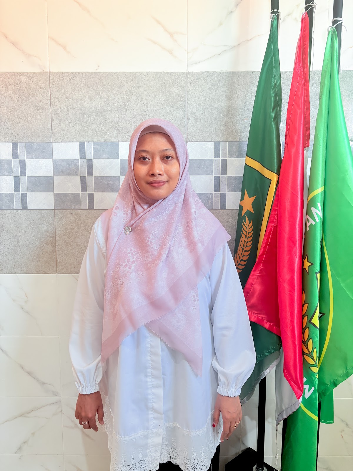 Rizqi Maulidah, S.Pd